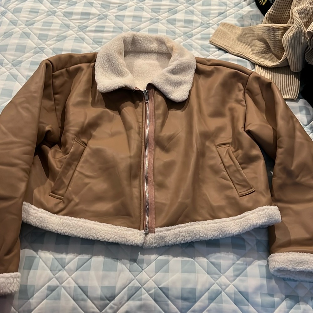 Cropped jacket unsure of size believe size medium